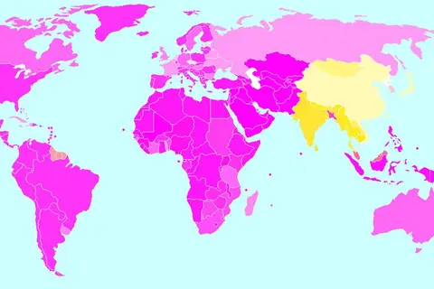 Map: Map showing the prevalence of Abrahamic (pink) and Dharmic religions (yellow) by country